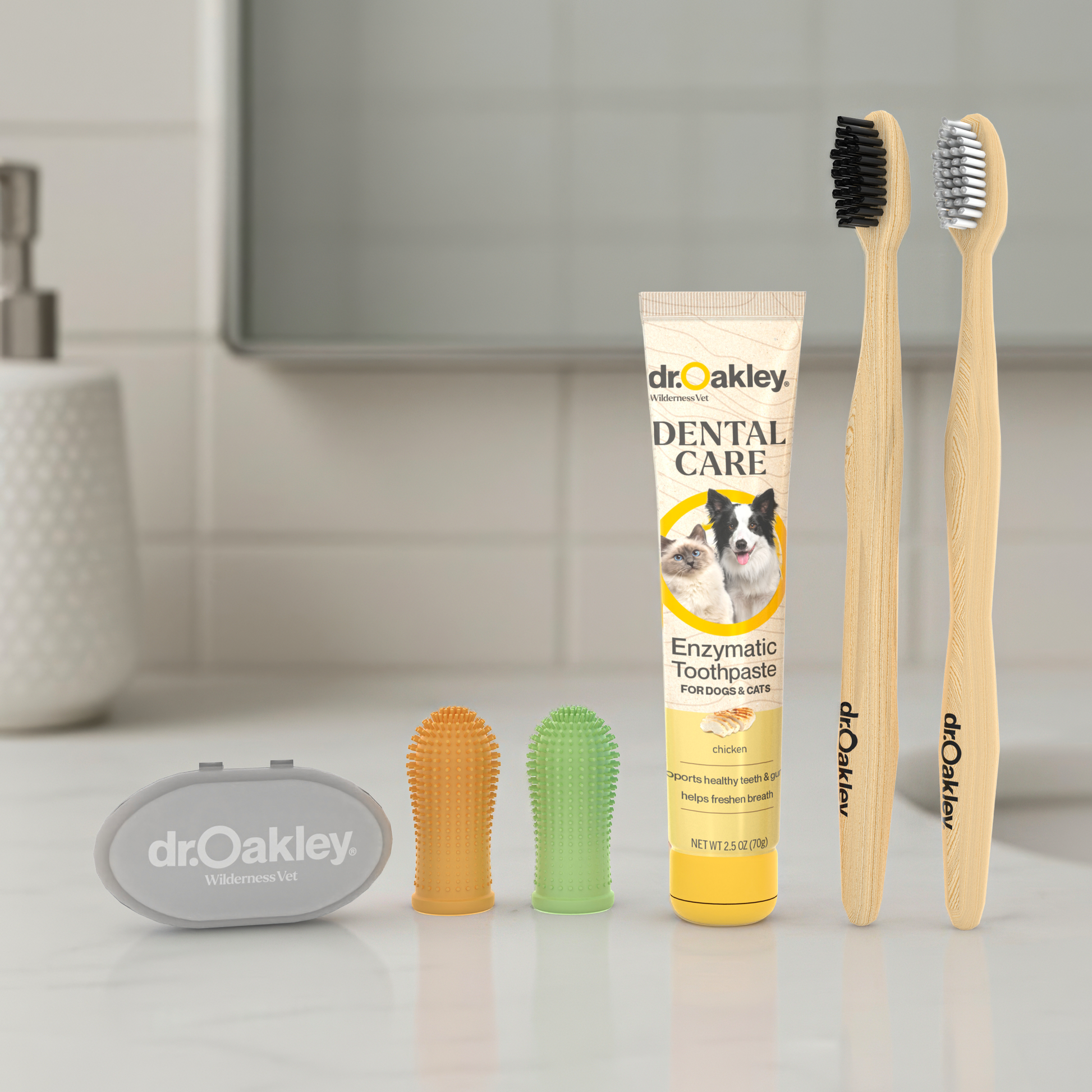 Dr. Oakley dental care products including chicken toothpaste, brushes, and a scrubber on a bathroom counter.
